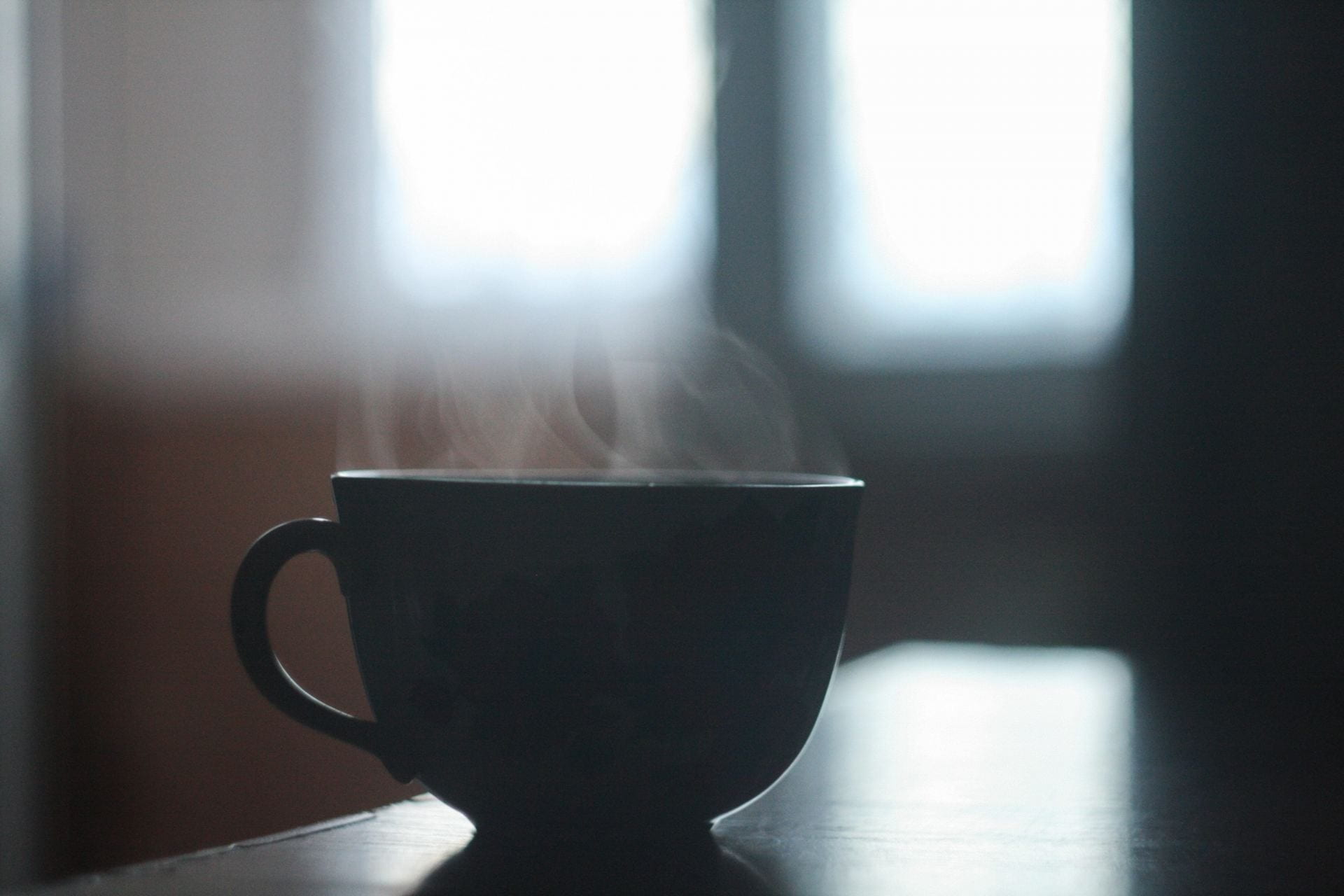 Close up of a cup of hot drink.