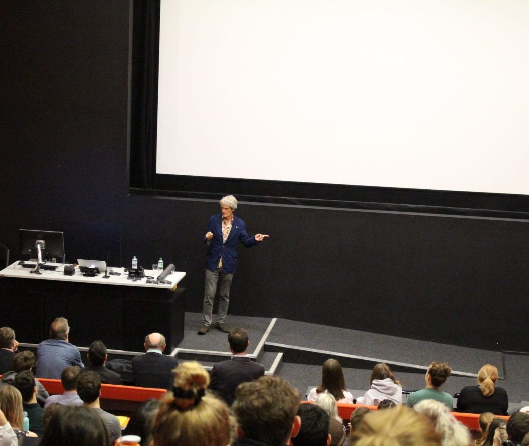 John Hegarty presenting in a lecture theatre.