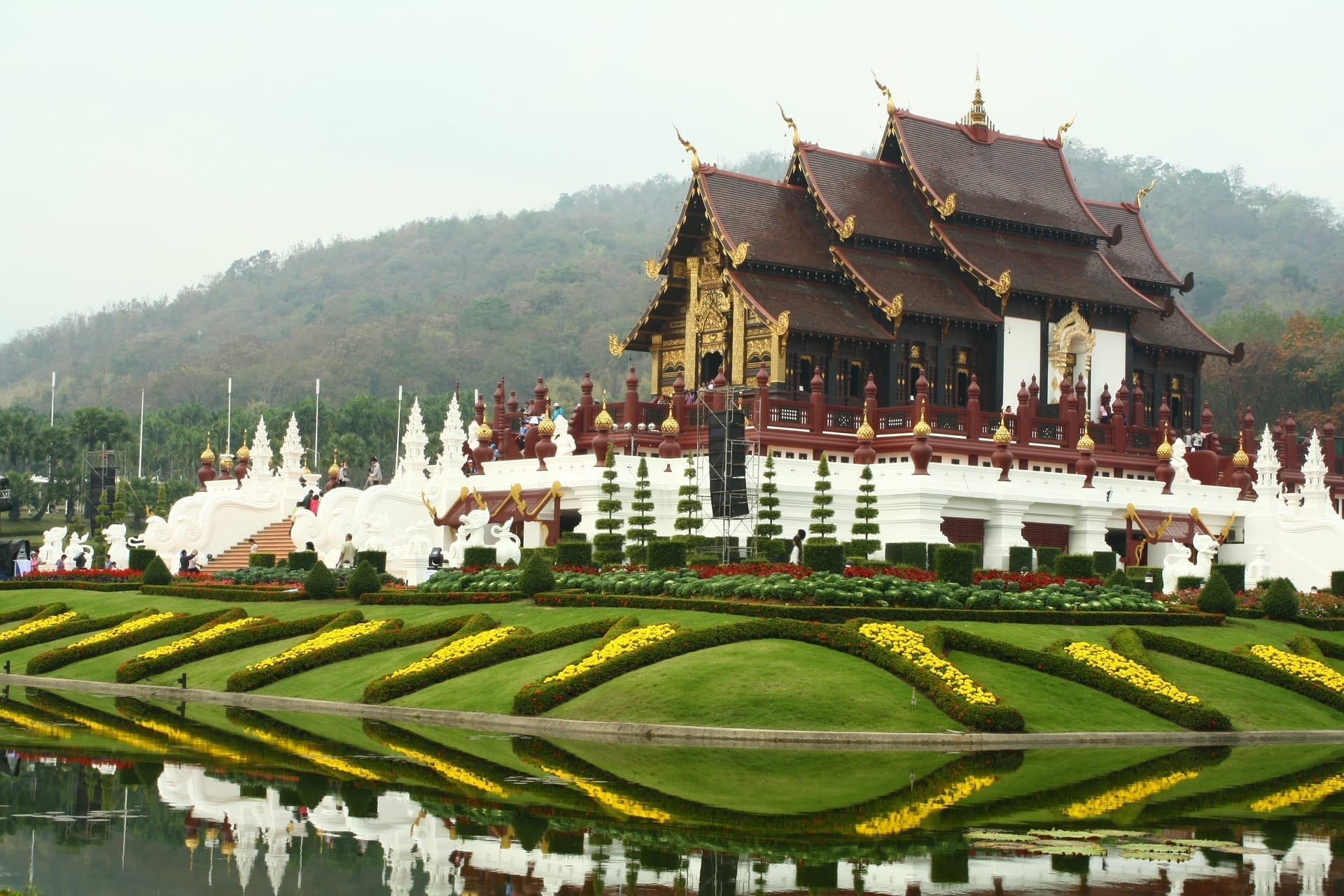 temple with garden and golden arches and trees