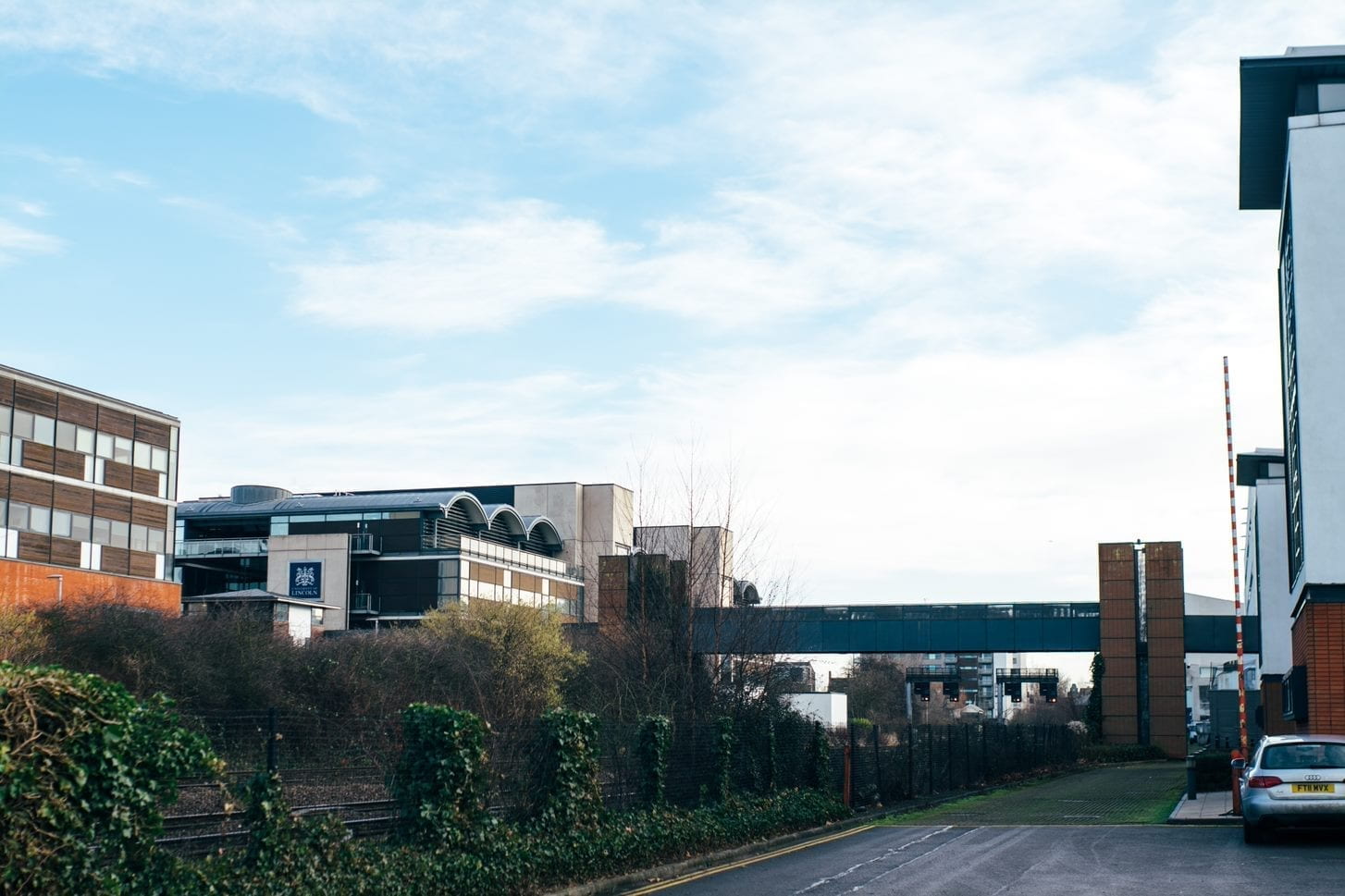 Photo of some of the University of Lincoln's buildings on campus on a bright day