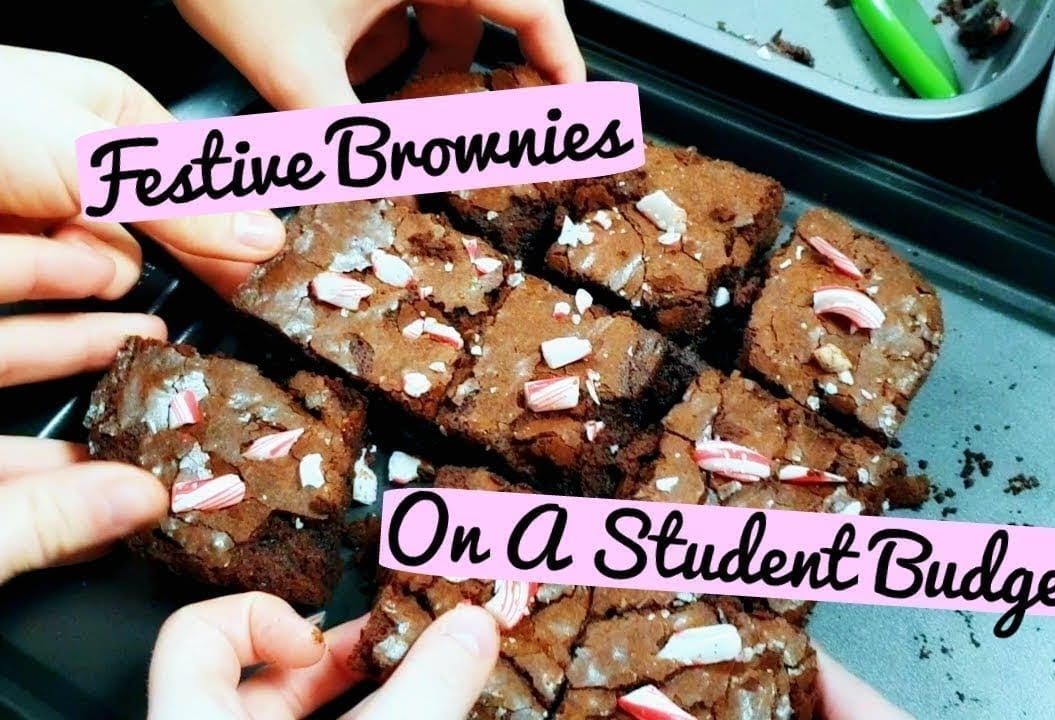 Thumbnail of people's hands taking pieces of brownie, saying 'festive brownies on a student budget'