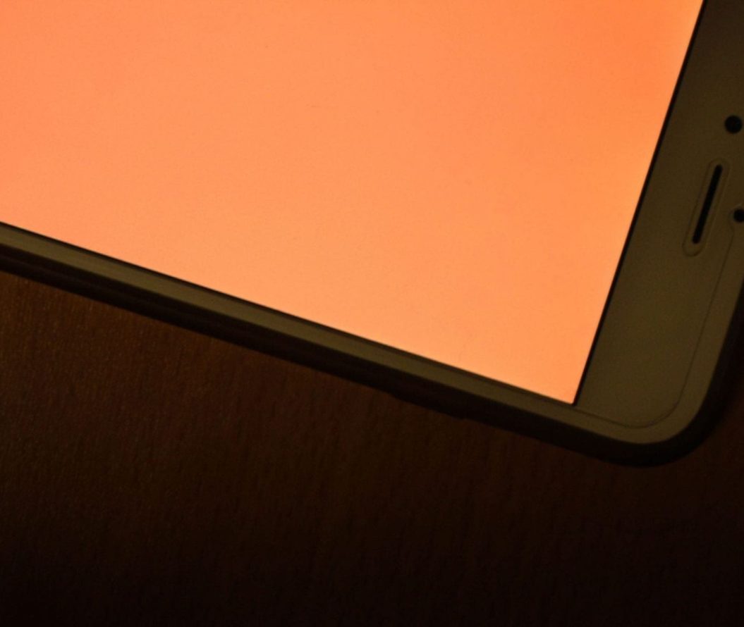 iPhone with an orange screen