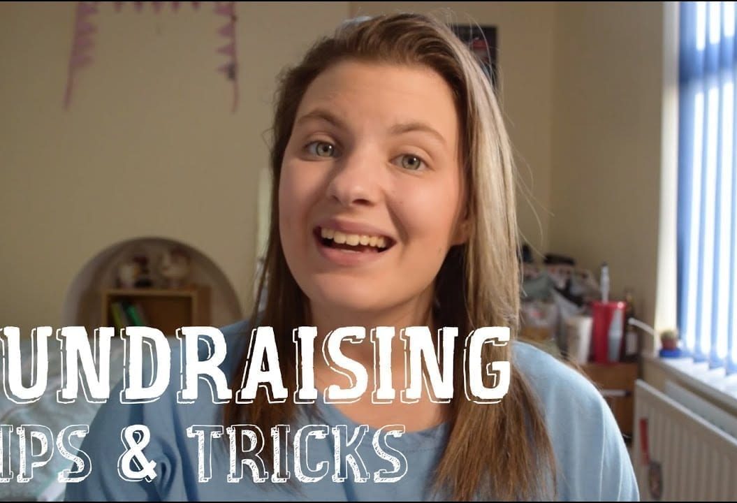 Thumbnail of a girl smiling, saying 'fundraising tips & tricks'