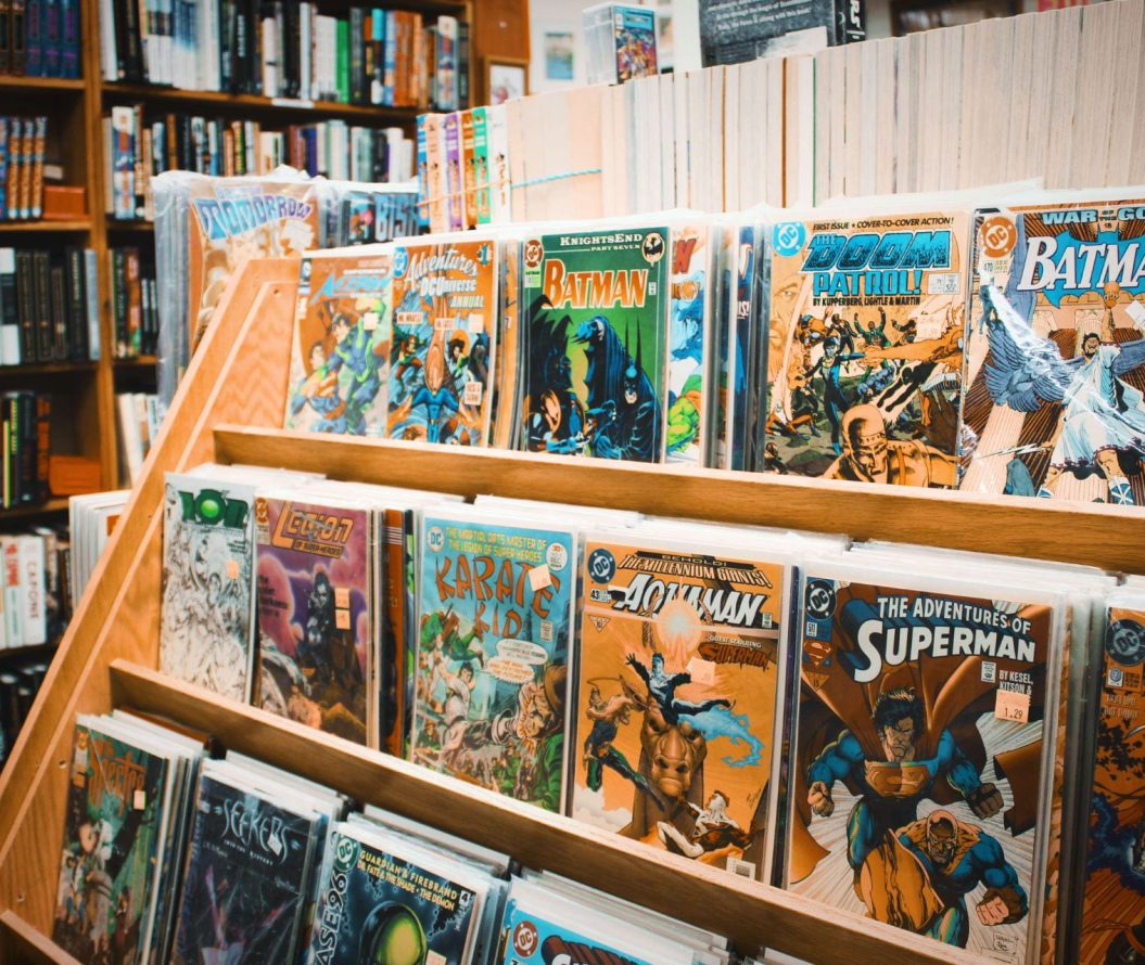 comics on a book shelf in a store