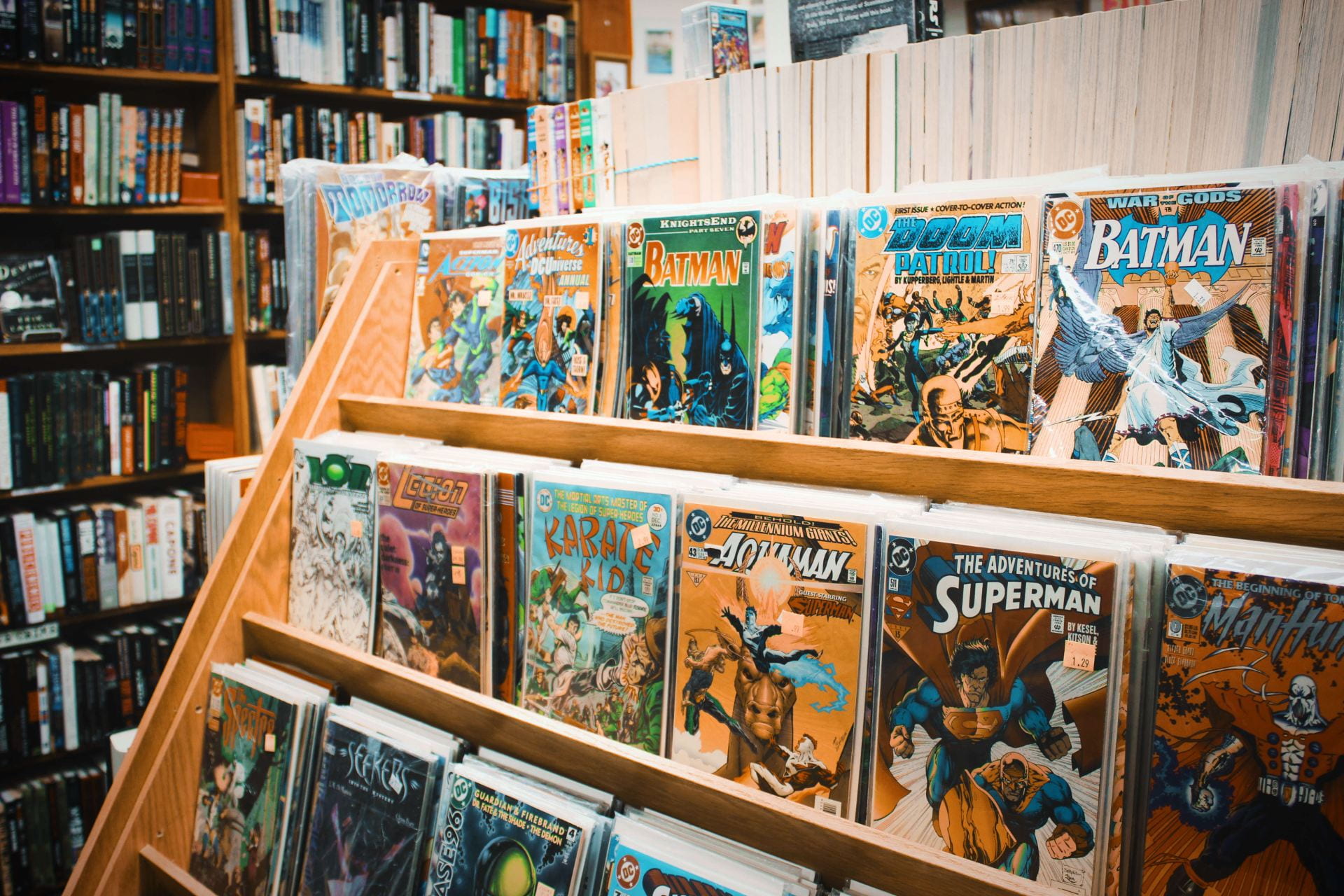 comics on a book shelf in a store