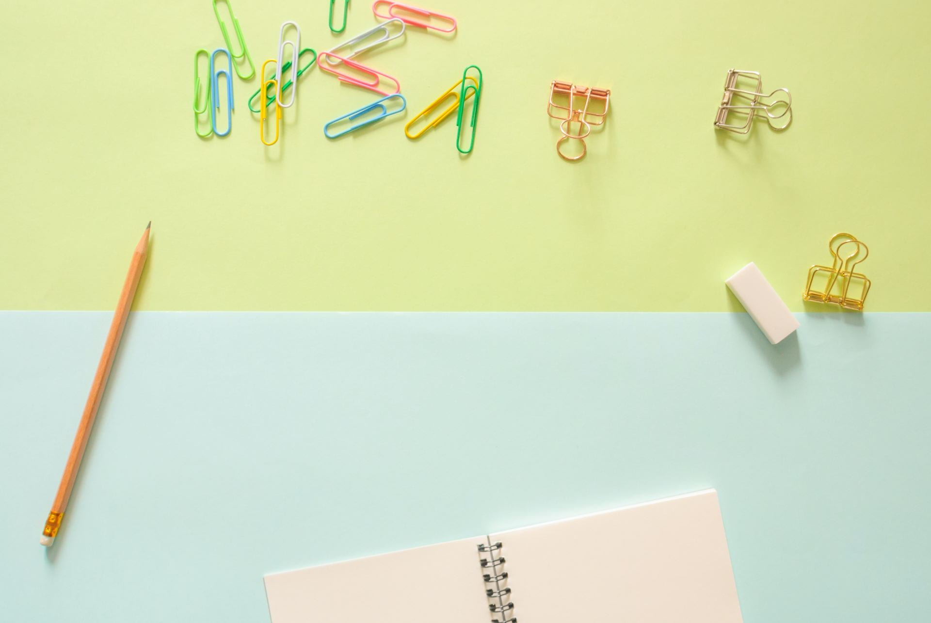 paperclips and paper scattered on desk