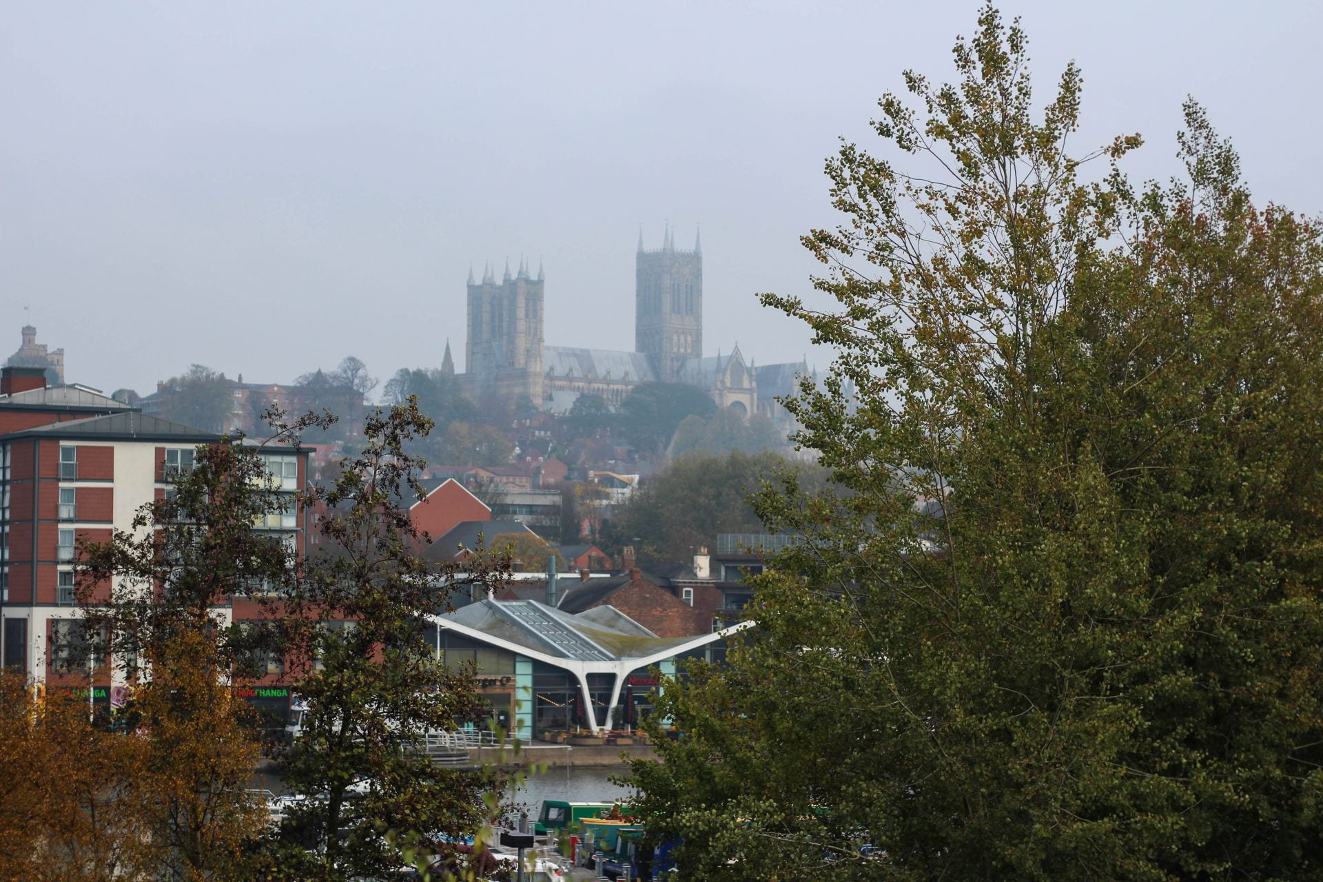 Photograph overlooking the Brayford river with the cathedral visible in the background