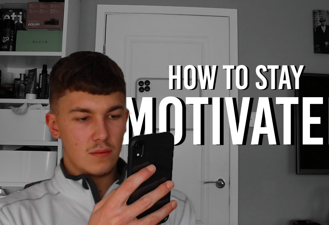 Ben centred on his phone with text saying 'How to stay motivated'
