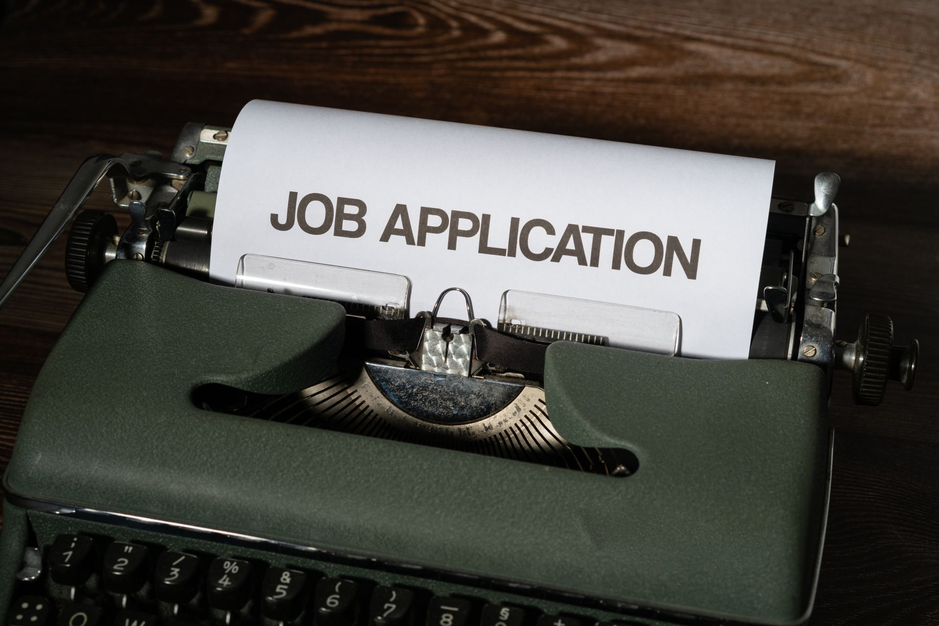A job application being written on a type writer