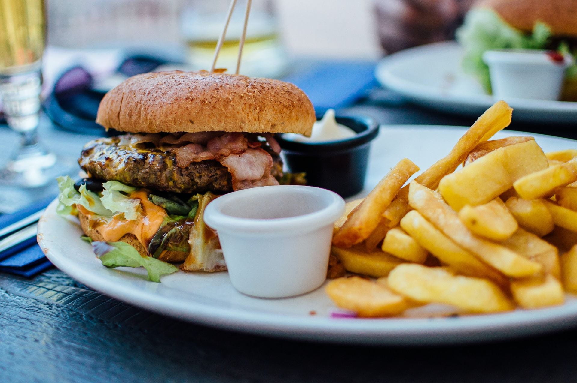 A plate of burger and chips to reward yourself with.