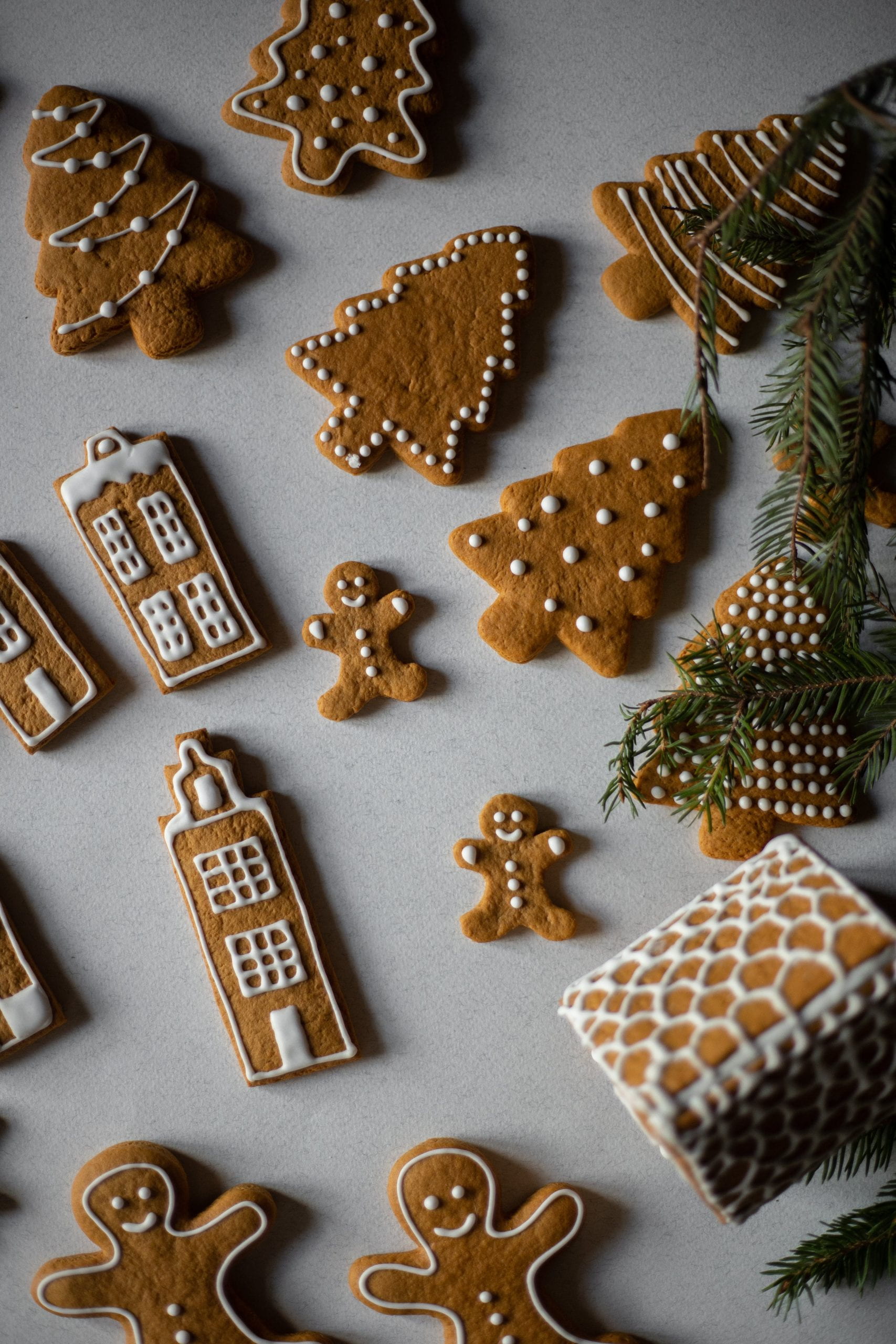gingerbread men and trees with icing on them