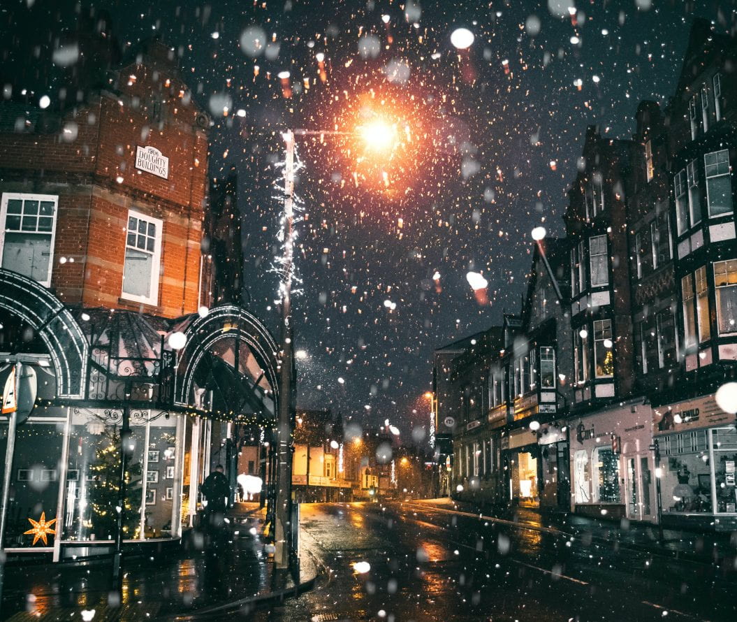 A Lincoln Christmas scene with snow and lights